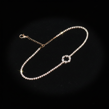 Rose gold crystal tennis bracelet with circle charm on dark luxury background