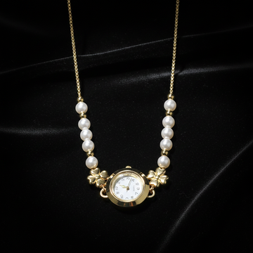 Pearl and gold watch pendant necklace on dark luxury background