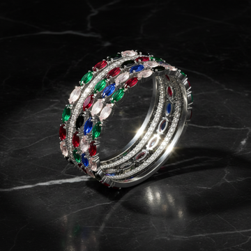 Multicolor crystal silver bangle set on dark luxury background
